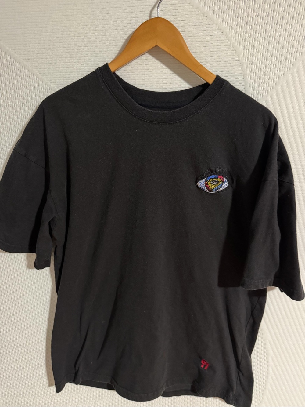 Men's Black Short-Sleeve Tee with Embroidered Eye Motif
